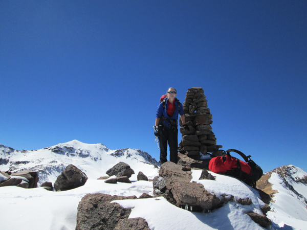 The main peak of Huarancante in the centre-left, as seen form the 5284m high west summit.